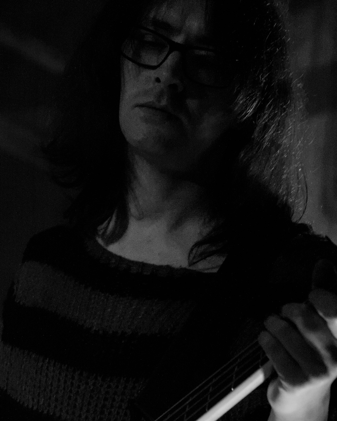 Band member performing live