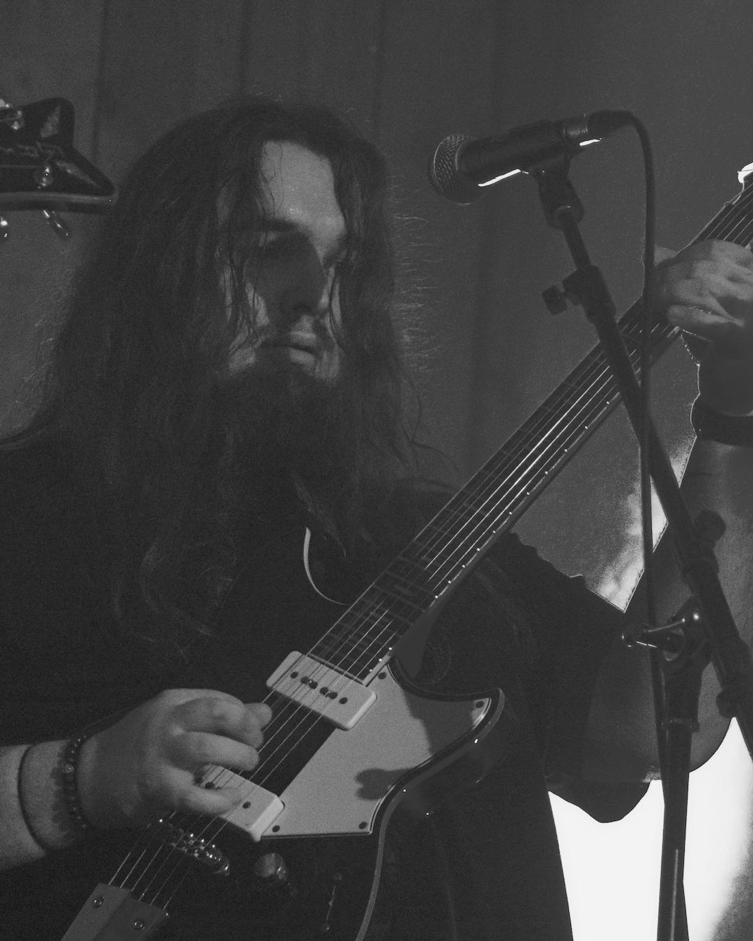 Band member performing live
