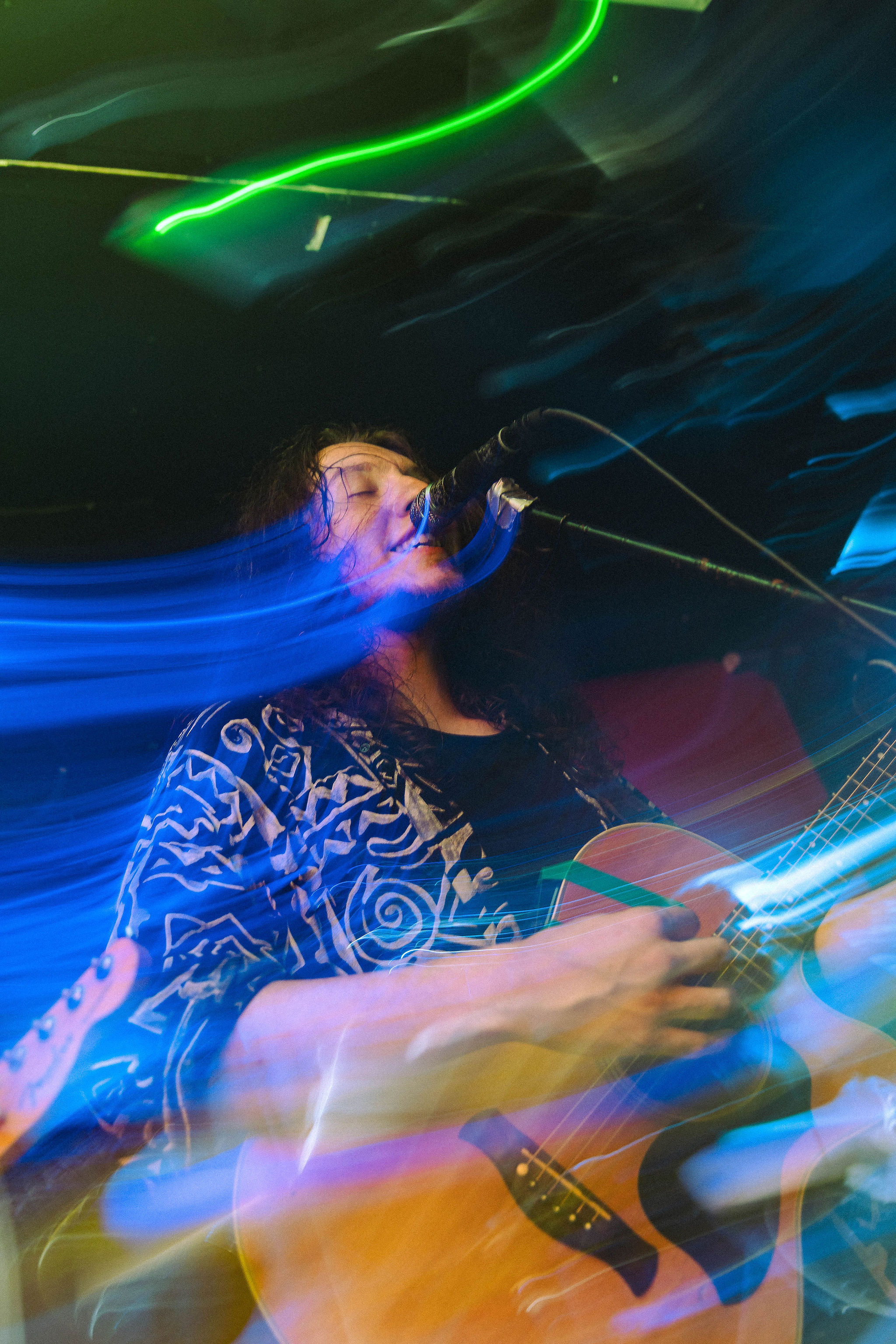 Singer performing with motion blur